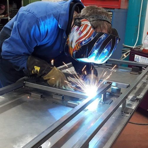 worker making structural steel